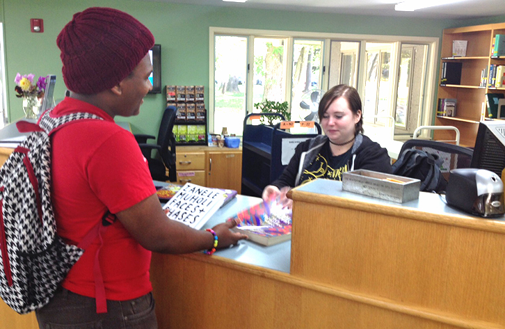 Student Borrowing book from circulation