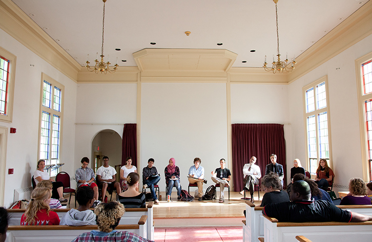 Students assemble for a community council.