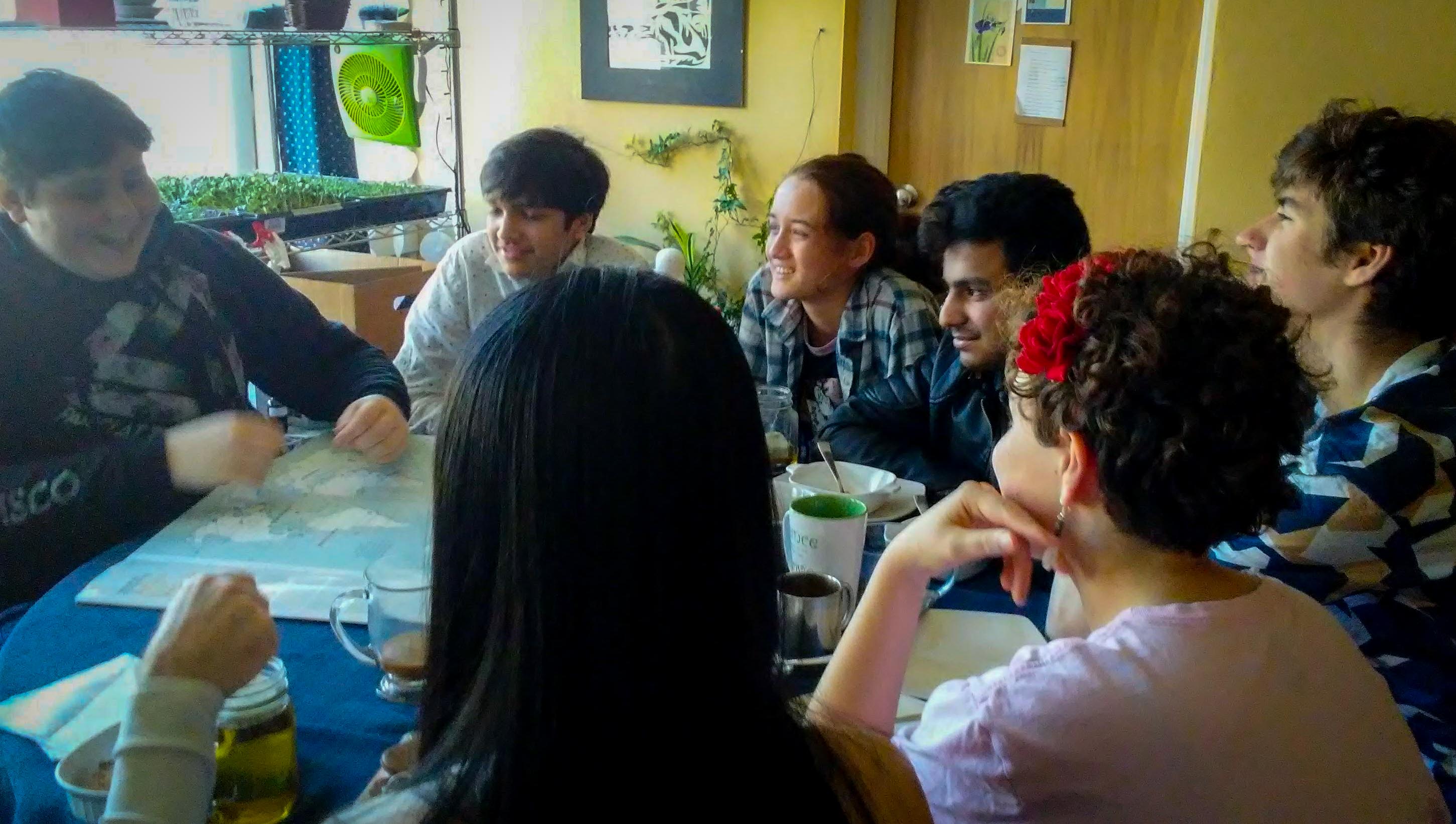 Students drinking tea and smiling